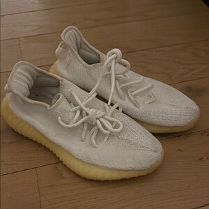 Yeezy White and Cream Athletic Shoes
